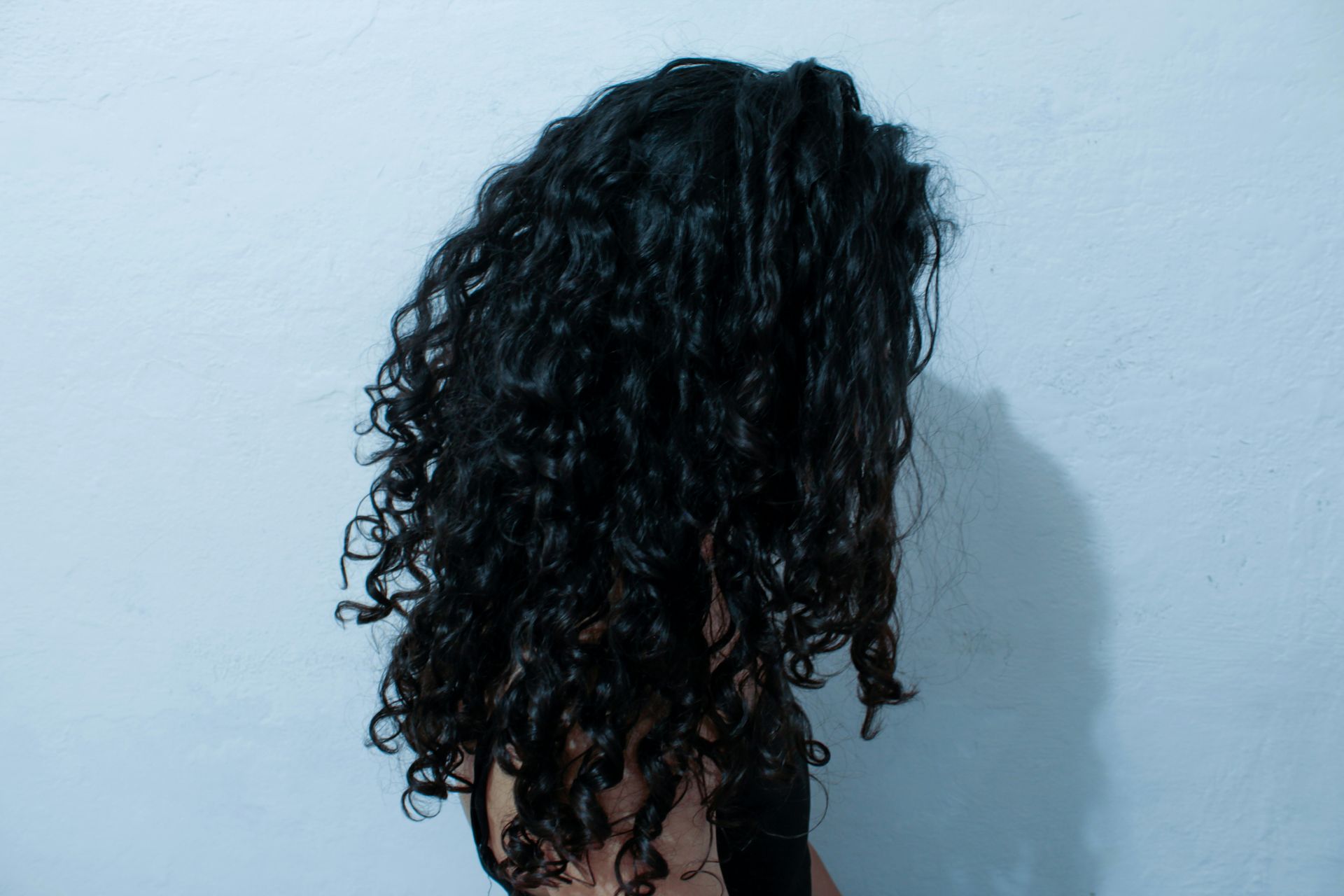 a person with the hair pulled back